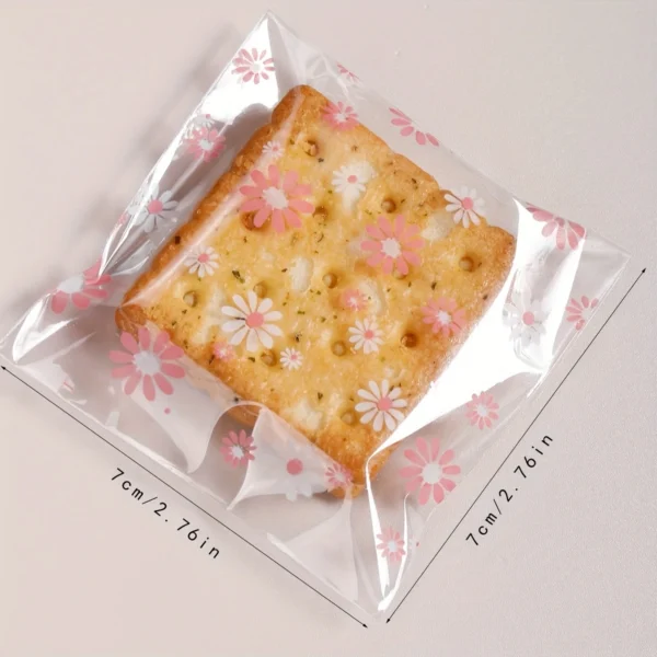 029067eb6fe29ccdf44cf835dc379da7.webp 100pcs Pink Flower Biscuit Candy Packaging Bag, Kitchen Supplies