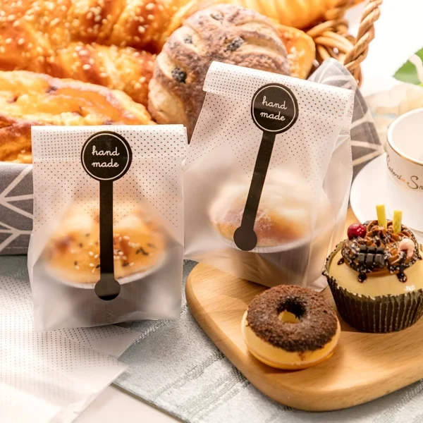 0378e167-9136-41b0-90ba-e0910e039980.webp 100pcs Translucent Plastic Bags for Cookie