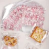 4e8e925f-d193-49db-9dc3-bdeddb53b4fb_1200x1200.webp 100pcs Pink Flower Biscuit Candy Packaging Bag, Kitchen Supplies