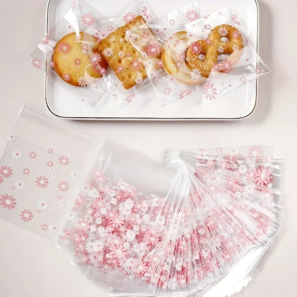 cc1e0be650dd400f872b58fa270f9f5c.webp 100pcs Pink Flower Biscuit Candy Packaging Bag, Kitchen Supplies